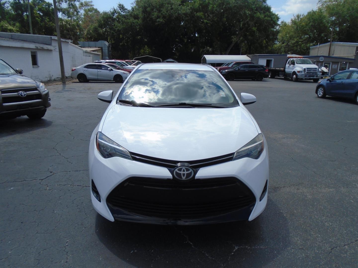 2018 Toyota Corolla (2T1BURHE6JC) , located at 6112 N Florida Avenue, Tampa, FL, 33604, (888) 521-5131, 27.954929, -82.459534 - Photo#1